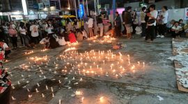Foto : Aksi seribu lilin masyarakat Toraja.