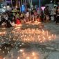 Foto : Aksi seribu lilin masyarakat Toraja.