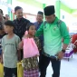Foto: Bupati Bulungan Syarwani saat menghadiri khitanan massal 86 anak di UPT Tanjung Palas Utara.