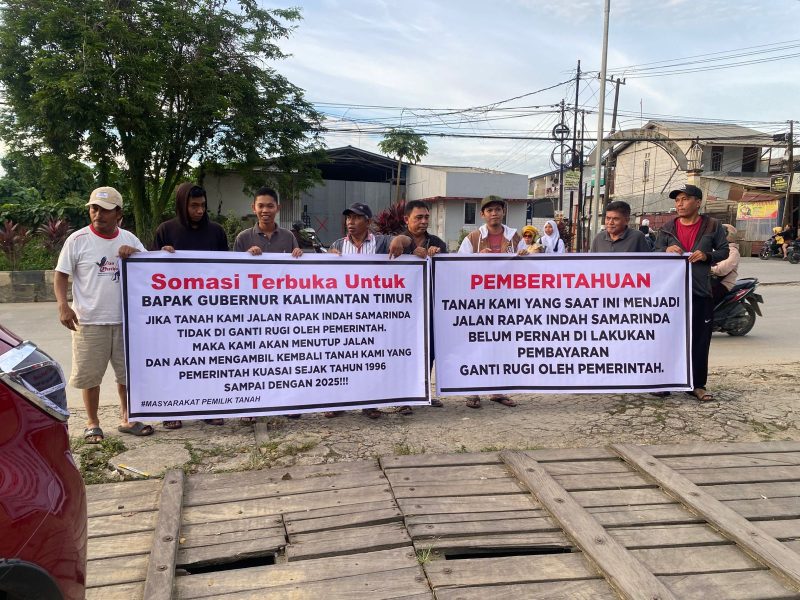 Foto: Warga Rapak Indah pasang spanduk keresahan terkait belum dibayarkannya ganti rugi oleh pemerintah (IST)